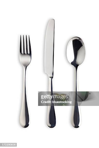silverware set with fork, knife, and spoon (clipping path) - tafelmes stockfoto's en -beelden