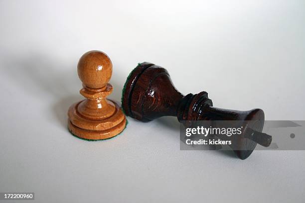 chess - one must fall - david and goliath stock pictures, royalty-free photos & images