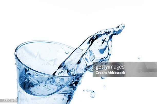 acqua splash - glass water foto e immagini stock