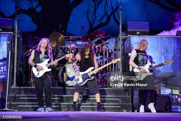 Dave Murray, Steve Harris, and Janick Gers of Iron Maiden perform onstage during the Power Trip music festival at Empire Polo Club on October 06,...