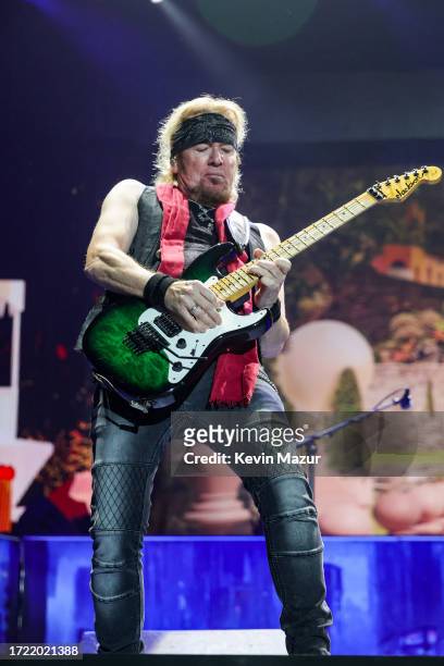 Adrian Smith of Iron Maiden performs onstage during the Power Trip music festival at Empire Polo Club on October 06, 2023 in Indio, California.