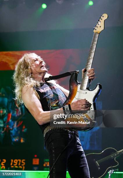 Janick Gers of Iron Maiden performs onstage during the Power Trip music festival at Empire Polo Club on October 06, 2023 in Indio, California.