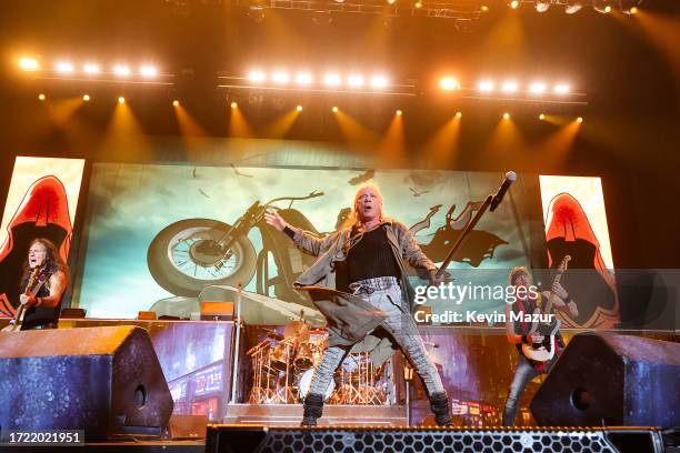 Steve Harris, Bruce Dickinson, and Adrian Smith of Iron Maiden perform onstage during the Power Trip music festival at Empire Polo Club on October...