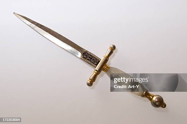 mini sword - letter opener stock pictures, royalty-free photos & images