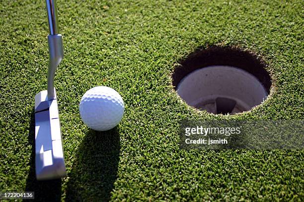 close putt - golf short iron stock pictures, royalty-free photos & images