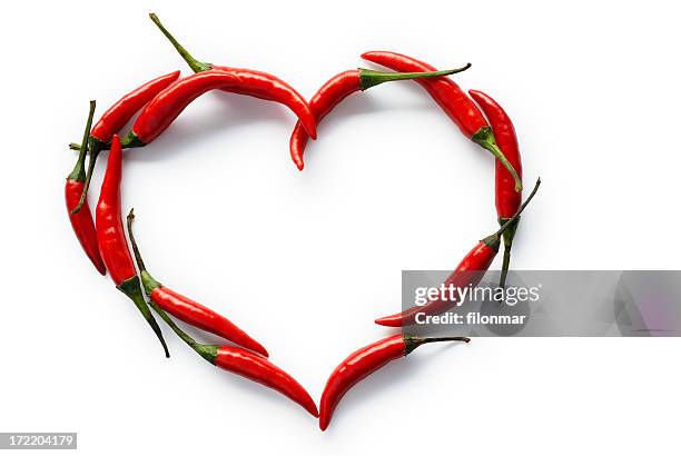 hot heart - cayenne powder stock pictures, royalty-free photos & images