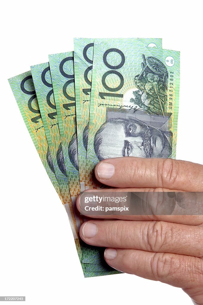 Australian Cash in the hand on white background