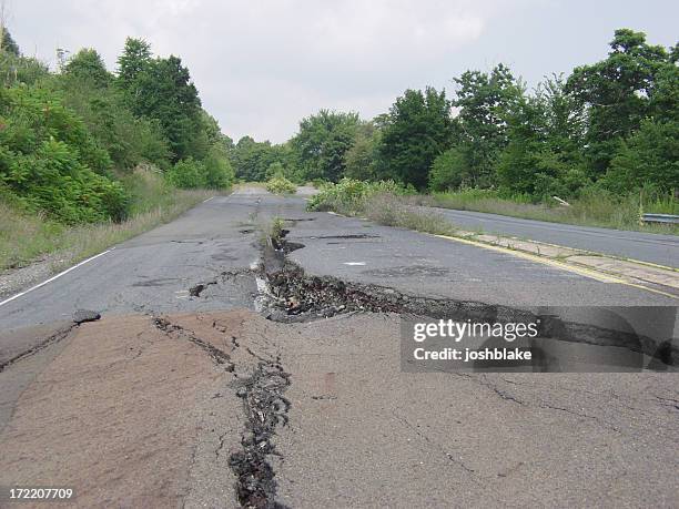 cracked road - earthquake road stock pictures, royalty-free photos & images