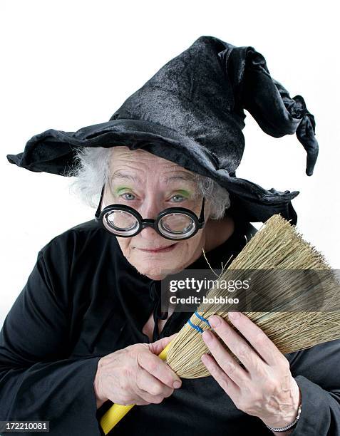 witch series - holding broom stock pictures, royalty-free photos & images