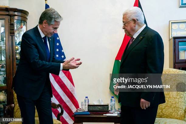 Secretary of State Antony Blinken speaks with Palestinian president Mahmud Abbas during a meeting in Amman on October 13, 2023. Blinken spent October...