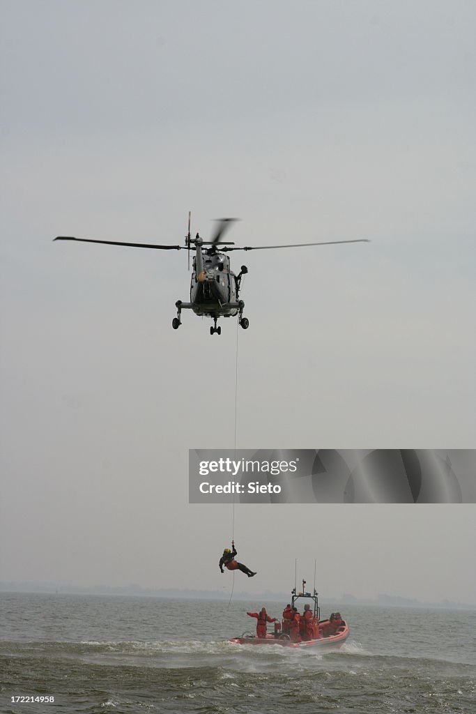 Coastguard performing SAR operation at sea