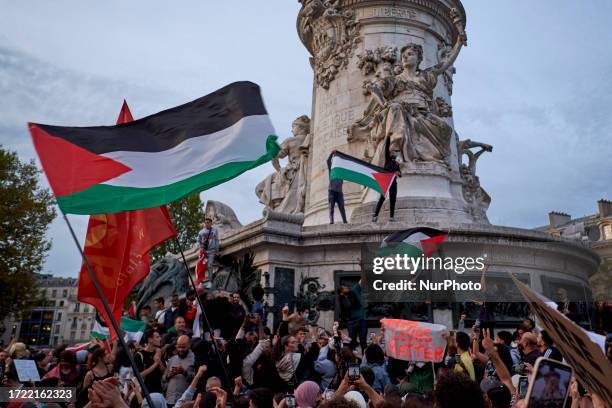 People gathered at the Place de la Republique for a prohibited pro palestinian protest in Paris on October 12, 2023. The police banned the...