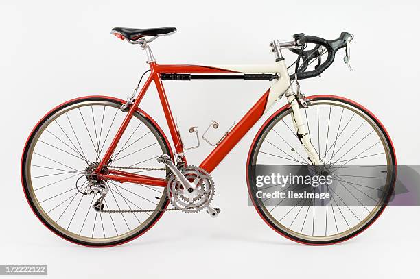 red and white racing touring bike with white background - bicycle isolated stockfoto's en -beelden