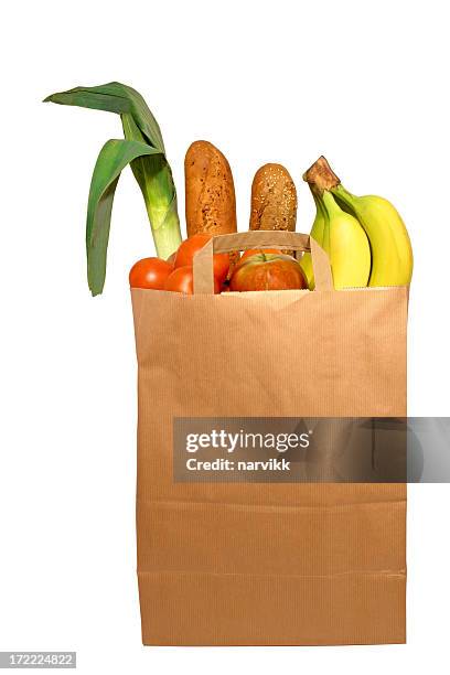 full paper bag with food products - brown paper isolated stock pictures, royalty-free photos & images