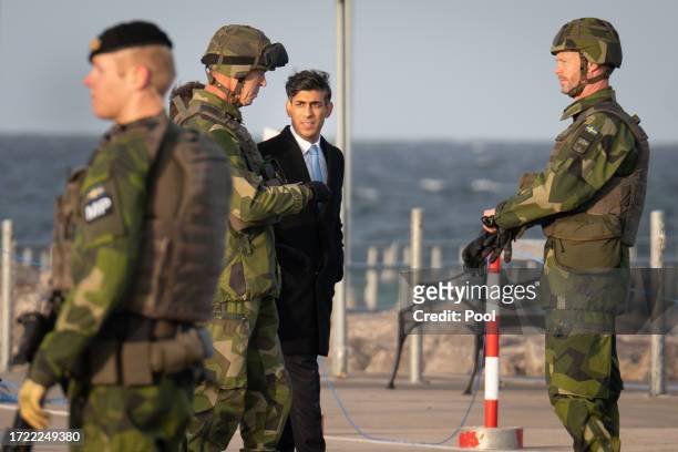 Prime Minister Rishi Sunak joins other political leaders to view military equipment that has been given to Ukraine before they attended the Joint...
