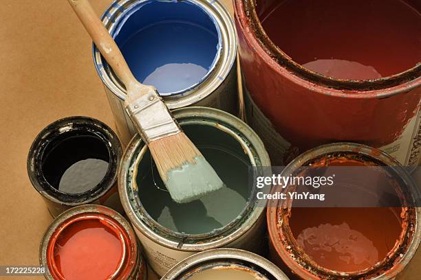 paint cans with paintbrush, latex colors for home improvement, decorating - latex stock pictures, royalty-free photos & images
