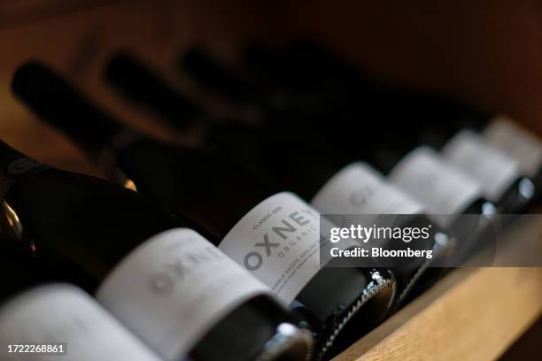 Bottles of English sparkling organic wine at the Oxney Organic Estate winery near Rye, UK, on Wednesday, Sept. 27, 2023. This summer was the warmest...