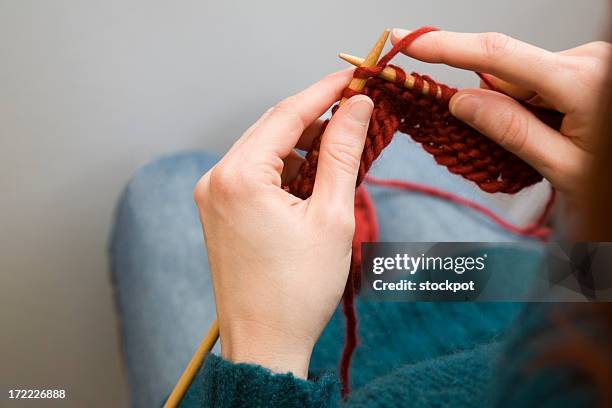 woman knitting 2 - knitting stock pictures, royalty-free photos & images