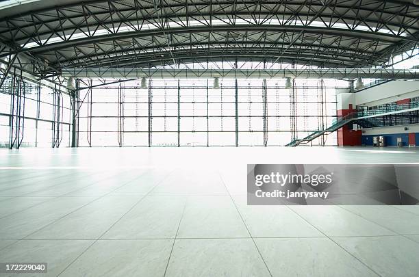 great empty hall - airplane hangar stock pictures, royalty-free photos & images