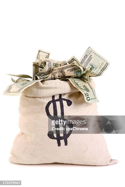 bolsa llena de dinero - money bag fotografías e imágenes de stock