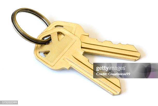 gold keys - house key stock-fotos und bilder