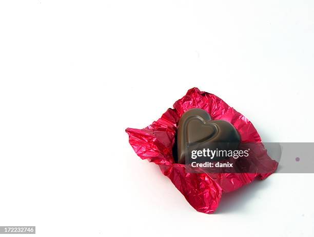 unwrap my heart - chocolate foil stock pictures, royalty-free photos & images
