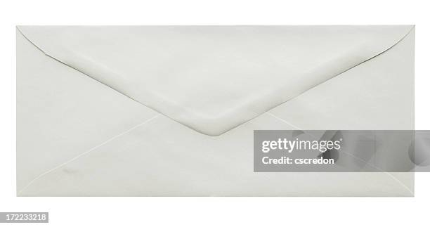 a empty white envelope on a white background - envelope stockfoto's en -beelden