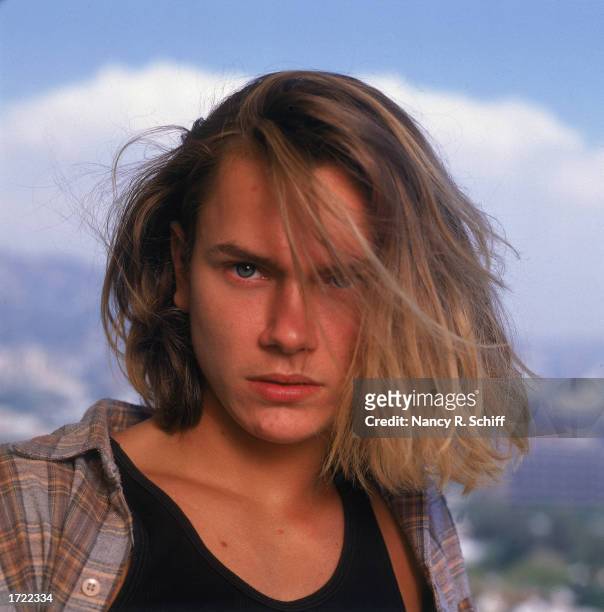 Outdoor headshot portrait of American actor River Phoenix , 1991.