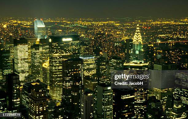 manhattan by night - gotham stock pictures, royalty-free photos & images