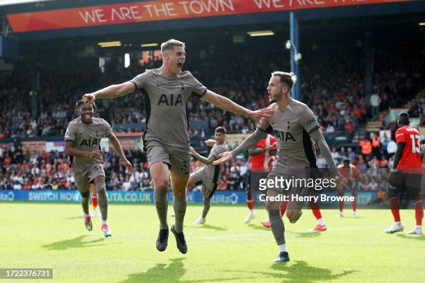 Micky van de Ven of Tottenham Hotspur celebrates after scoring the team's first goal during the Premier League match between Luton Town and Tottenham...