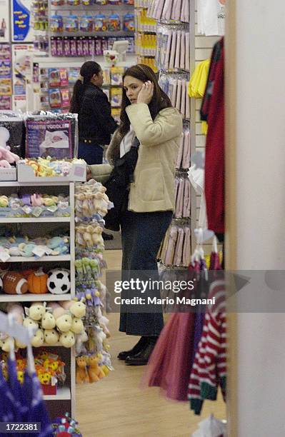 Actress Talisa Soto, the wife of actor Benjamin Bratt, shops in a store with her baby girl, Sophia Rosalinda Bratt, and her husband December 19, 2002...