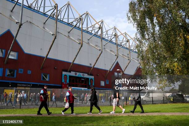 Burnley fans arrive at the stadium prior to the Premier League match between Burnley FC and Chelsea FC at Turf Moor on October 07, 2023 in Burnley,...
