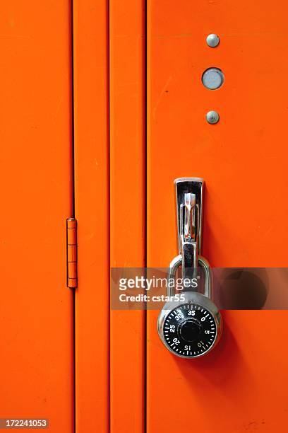 combination metal lock & orange locker - safe lock stock pictures, royalty-free photos & images