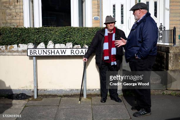 Burnley fans arrive at the stadium prior to the Premier League match between Burnley FC and Chelsea FC at Turf Moor on October 07, 2023 in Burnley,...