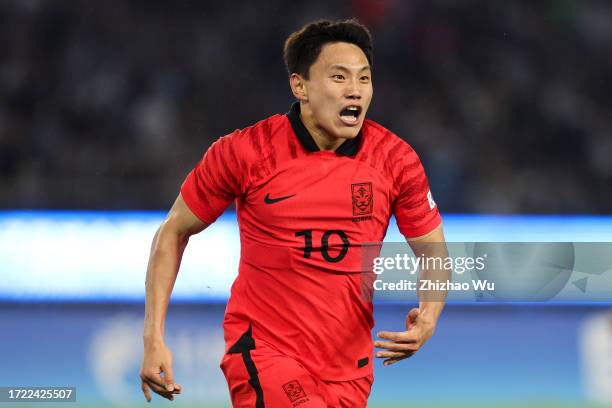 Cho Youngwook of South Korea celebrates his goal during the 19th Asian Game men's gold medal match between South Korea and Japan at Huanglong Sports...