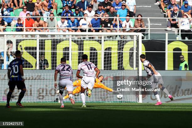 Riccardo Orsolini of Bologna FC scores their sides first goal from the penalty spot during the Serie A TIM match between FC Internazionale and...