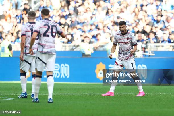 Riccardo Orsolini of Bologna FC celebrates after scoring their sides first goal from the penalty spot during the Serie A TIM match between FC...