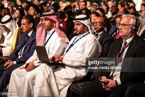 Participants attend attend the 2023 annual meeting of the International Monetary Fund and the World Bank Group , in Marrakesh on October 13, 2023.