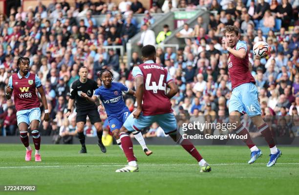 Raheem Sterling of Chelsea shoots during the Premier League match between Burnley FC and Chelsea FC at Turf Moor on October 07, 2023 in Burnley,...