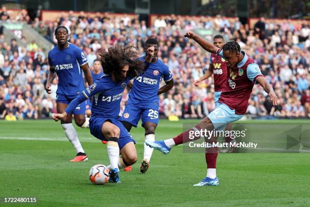 Wilson Odobert of Burnley scores their sides first goal during the Premier League match between Burnley FC and Chelsea FC at Turf Moor on October 07,...