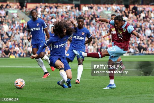 Wilson Odobert of Burnley scores their sides first goal during the Premier League match between Burnley FC and Chelsea FC at Turf Moor on October 07,...