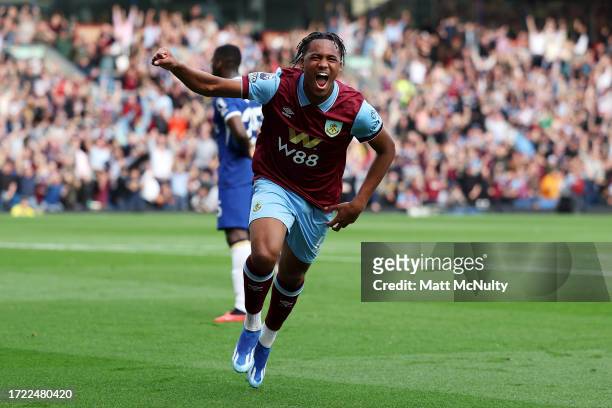 Wilson Odobert of Burnley celebrates after scoring their sides first goal during the Premier League match between Burnley FC and Chelsea FC at Turf...