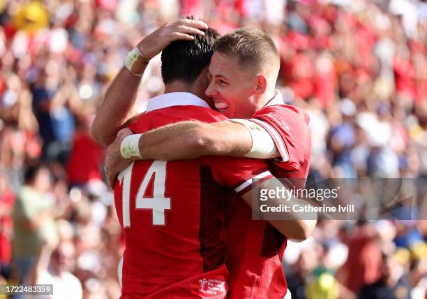 Louis Rees-Zammit of Wales celebrates with Liam Williams of Wales after scoring his team's fourth try during the Rugby World Cup France 2023 match...