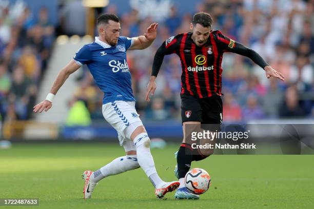 Jack Harrison of Everton battles for possession with Adam Smith of AFC Bournemouth during the Premier League match between Everton FC and AFC...