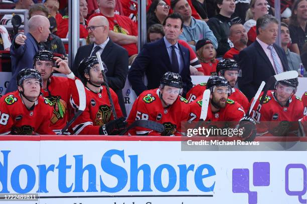 Head coach Luke Richardson of the Chicago Blackhawks looks on against the Detroit Red Wings during the third period of preseason game at the United...