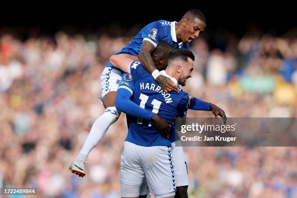 Jack Harrison of Everton celebrates with teammates after scoring the team's second goal during the Premier League match between Everton FC and AFC...