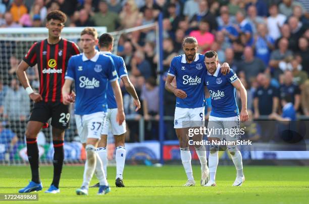 Jack Harrison of Everton celebrates with teammate Dominic Calvert-Lewin after scoring the team's second goal during the Premier League match between...