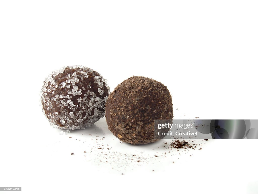 Two Chocolate truffles on white background