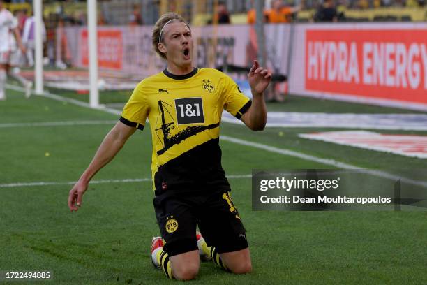 Julian Brandt of Borussia Dortmund celebrates after scoring their sides third goal during the Bundesliga match between Borussia Dortmund and 1. FC...