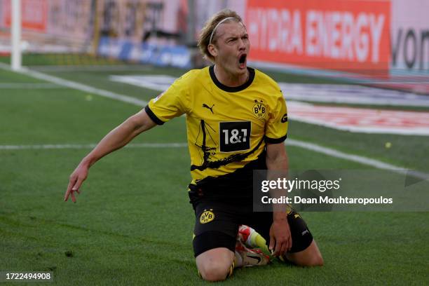 Julian Brandt of Borussia Dortmund celebrates after scoring their sides third goal during the Bundesliga match between Borussia Dortmund and 1. FC...